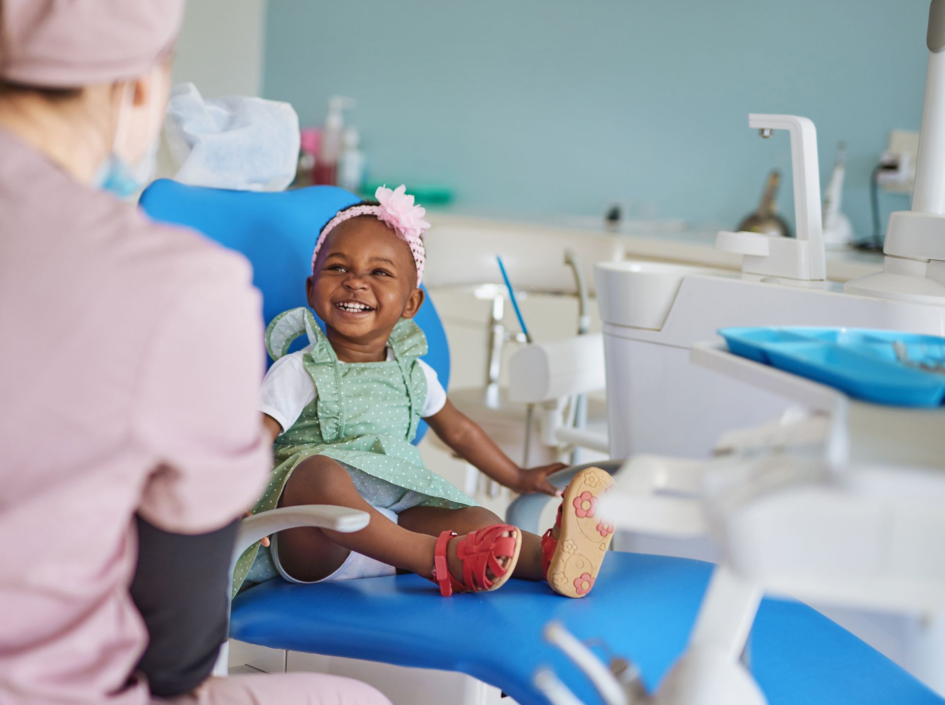 Pediatric dentistry-Shot of an adorable little girl getting a checkup at the dentist] 