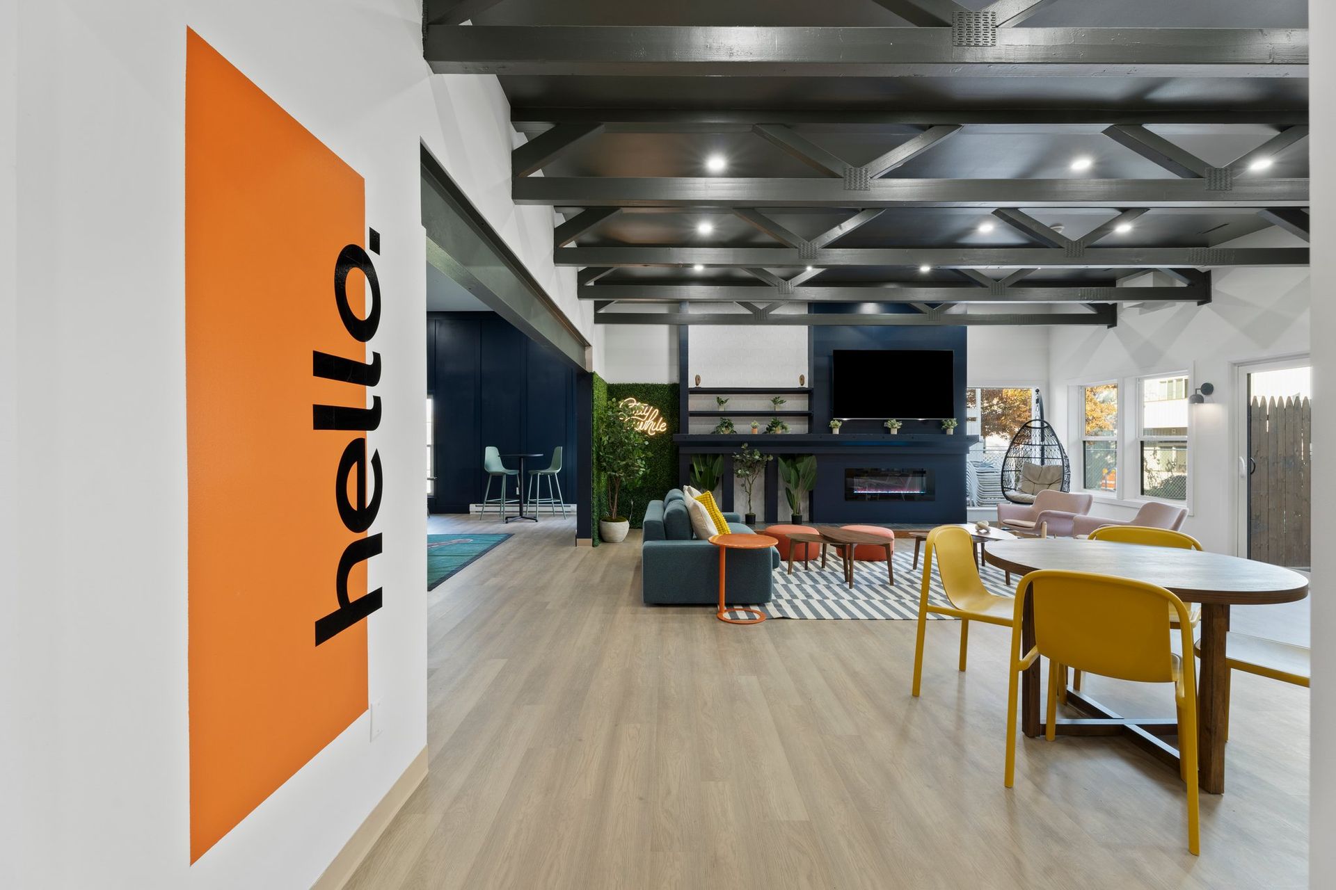 a room with a sign that says hello on it