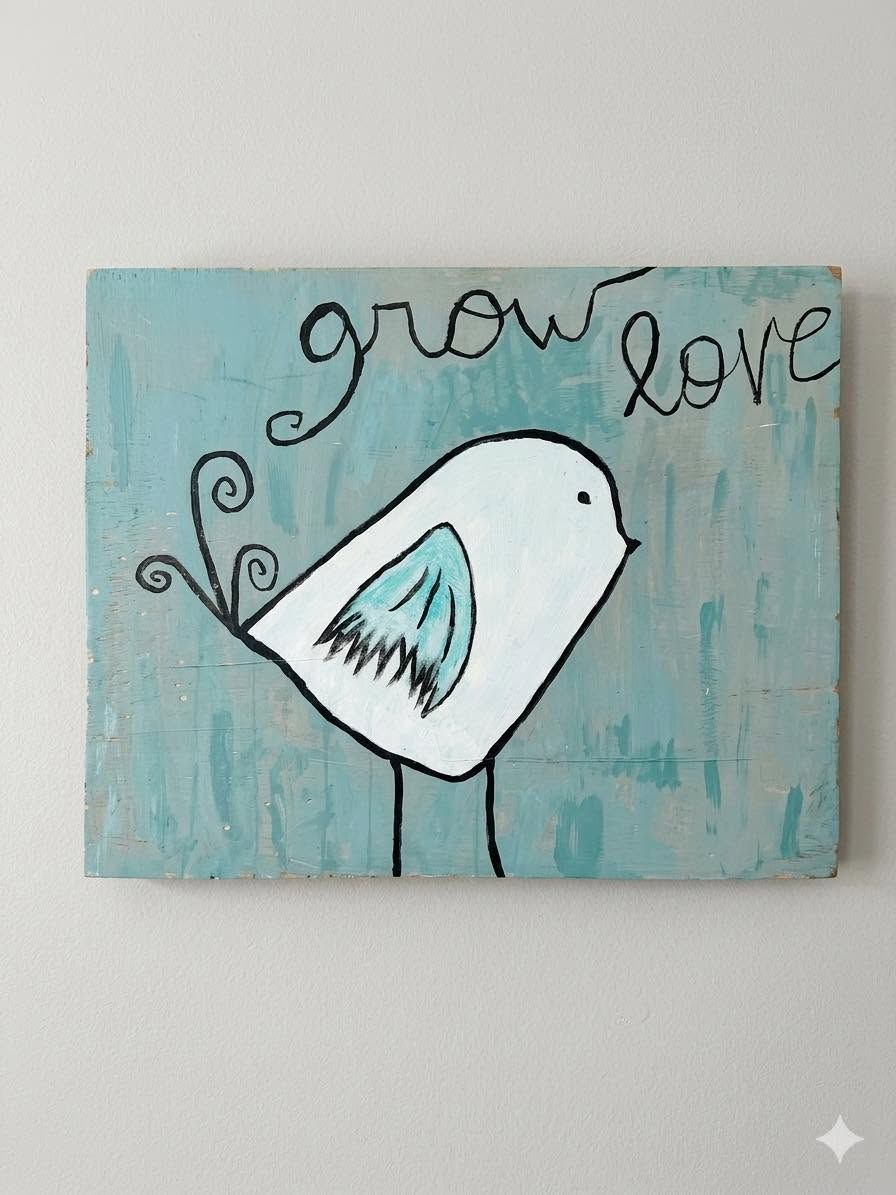 Hand-painted bird on teal background with the words “grow love” above it