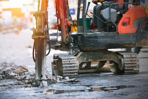 Demolition Services — Machine Drilling Road For Repairing in Exeter, CA