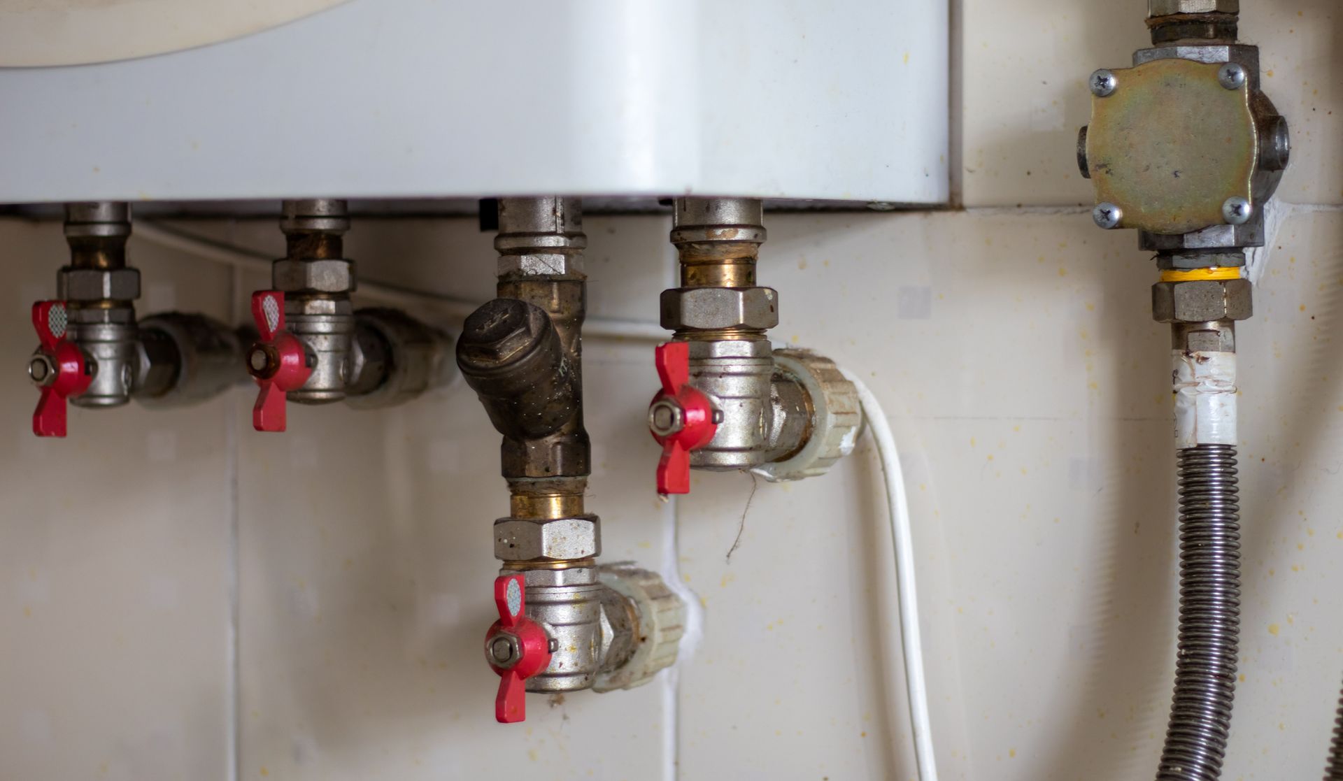 A Water Heater with Pipes and Valves — Nuflow Wide Bay in Bargara, QLD