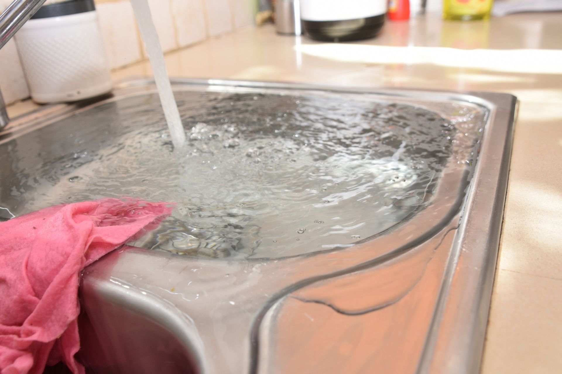 A Water Filling a Stainless Steel Sink — Nuflow Wide Bay in Gin Gin, QLD