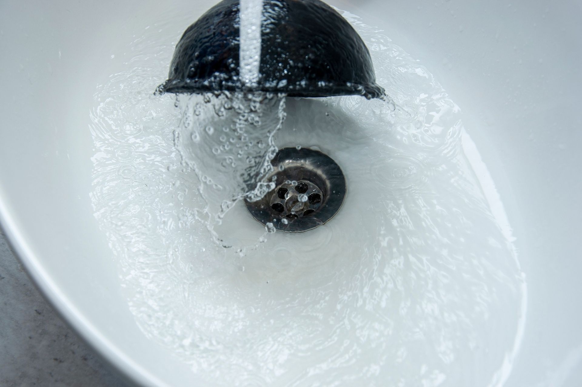 A Plunger in A Sink with Water Swirling — Nuflow Wide Bay in Bundaberg South, QLD