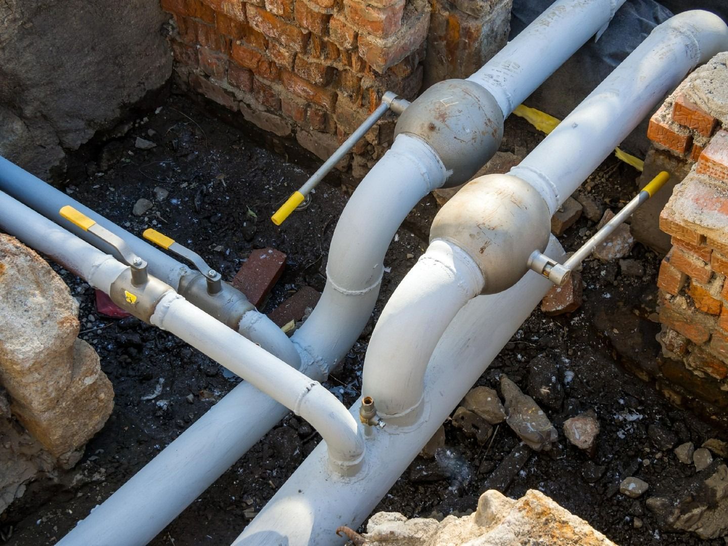 A Gray Pipes with Handles in A Brick Lined Trench — Nuflow Wide Bay in Bundaberg South, QLD
