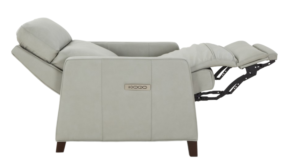 Cream-colored leather recliner chair with extended footrest, and upright back.