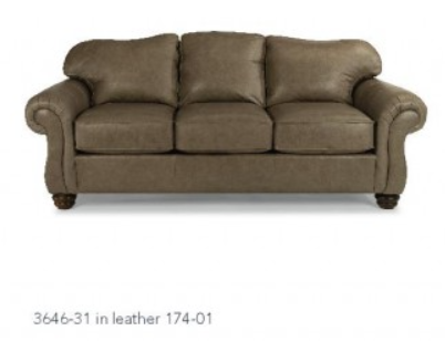 Tan leather three-seat sofa with rolled arms, three back cushions, and wooden feet.