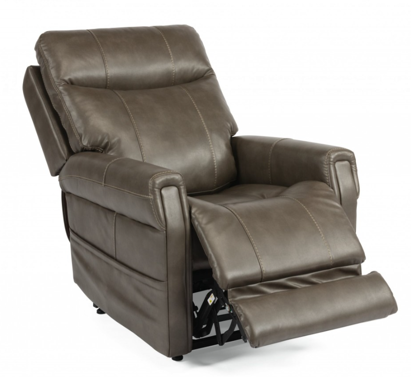 Brown leather lift chair reclined with footrest extended.