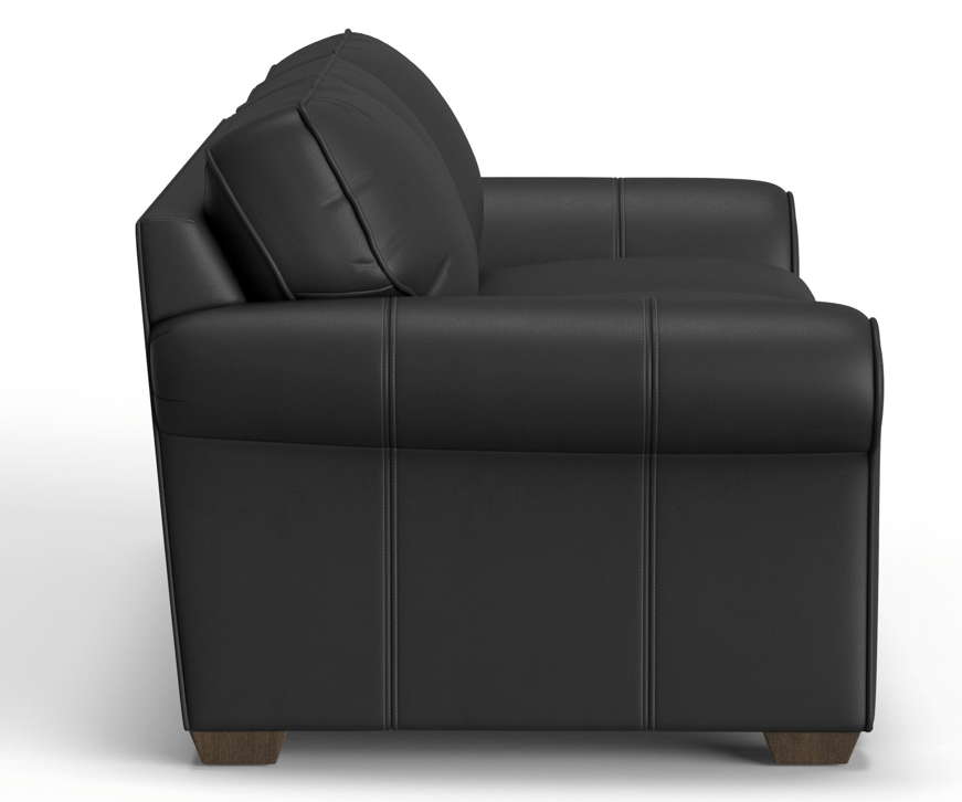 Black leather sofa, side view, on a white background. Brown square feet.
