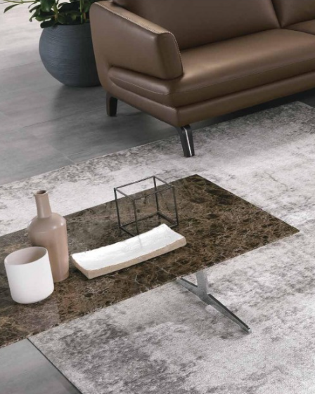 Brown-topped coffee table with silver legs on white background.
