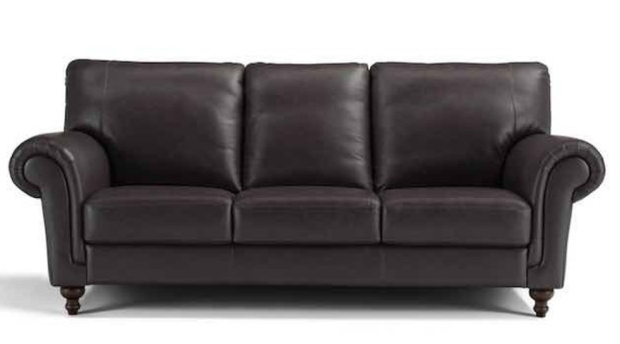 Brown leather three-seater sofa with rolled arms, wooden legs, and three back cushions.