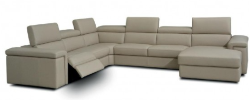 A large, light-colored sectional sofa with adjustable headrests and a reclining feature.