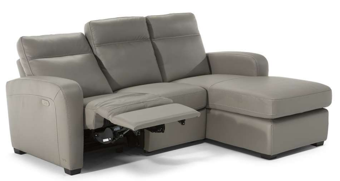 Burgundy leather sofa with three sections and padded backrests.