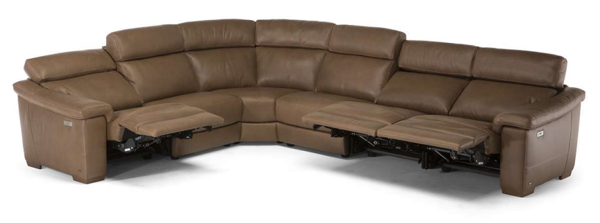 Brown leather sectional sofa with reclining seats.
