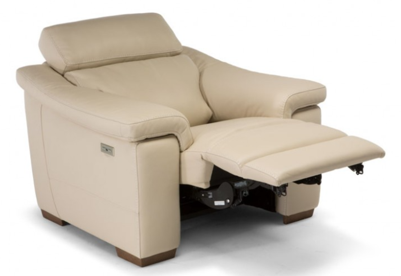 Beige leather recliner with headrest and footrest extended.