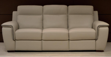 Beige leather sofa with three sections, black trim, and a dark wooden base.