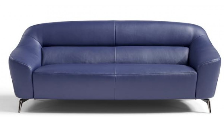 Blue leather sofa with curved arms and metal legs.
