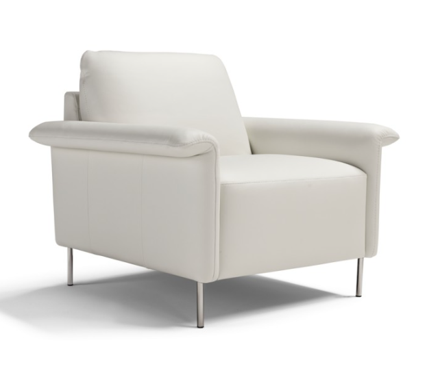 Beige leather sectional sofa with black legs.