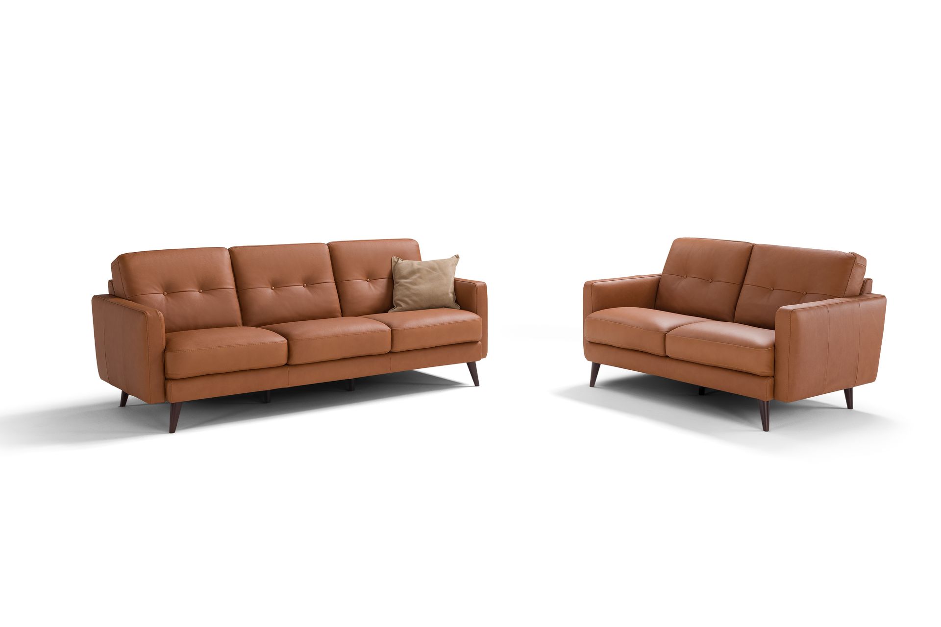 Two brown leather sofas on a white background. One three-seater and one two-seater.