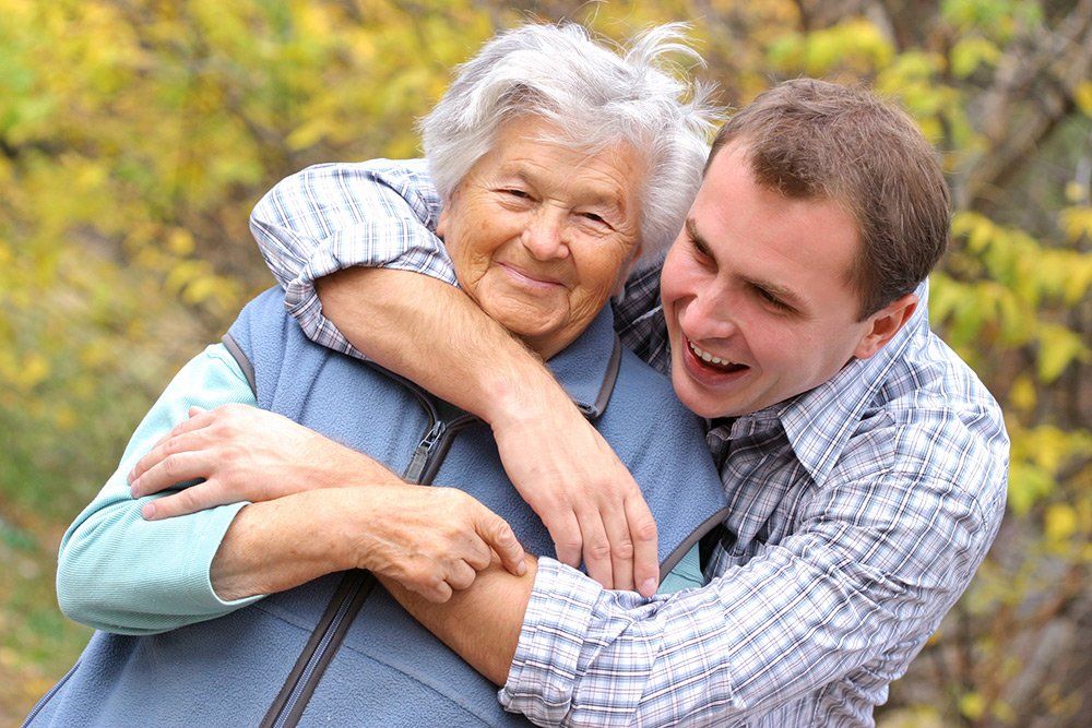 grandson hugging grandmother