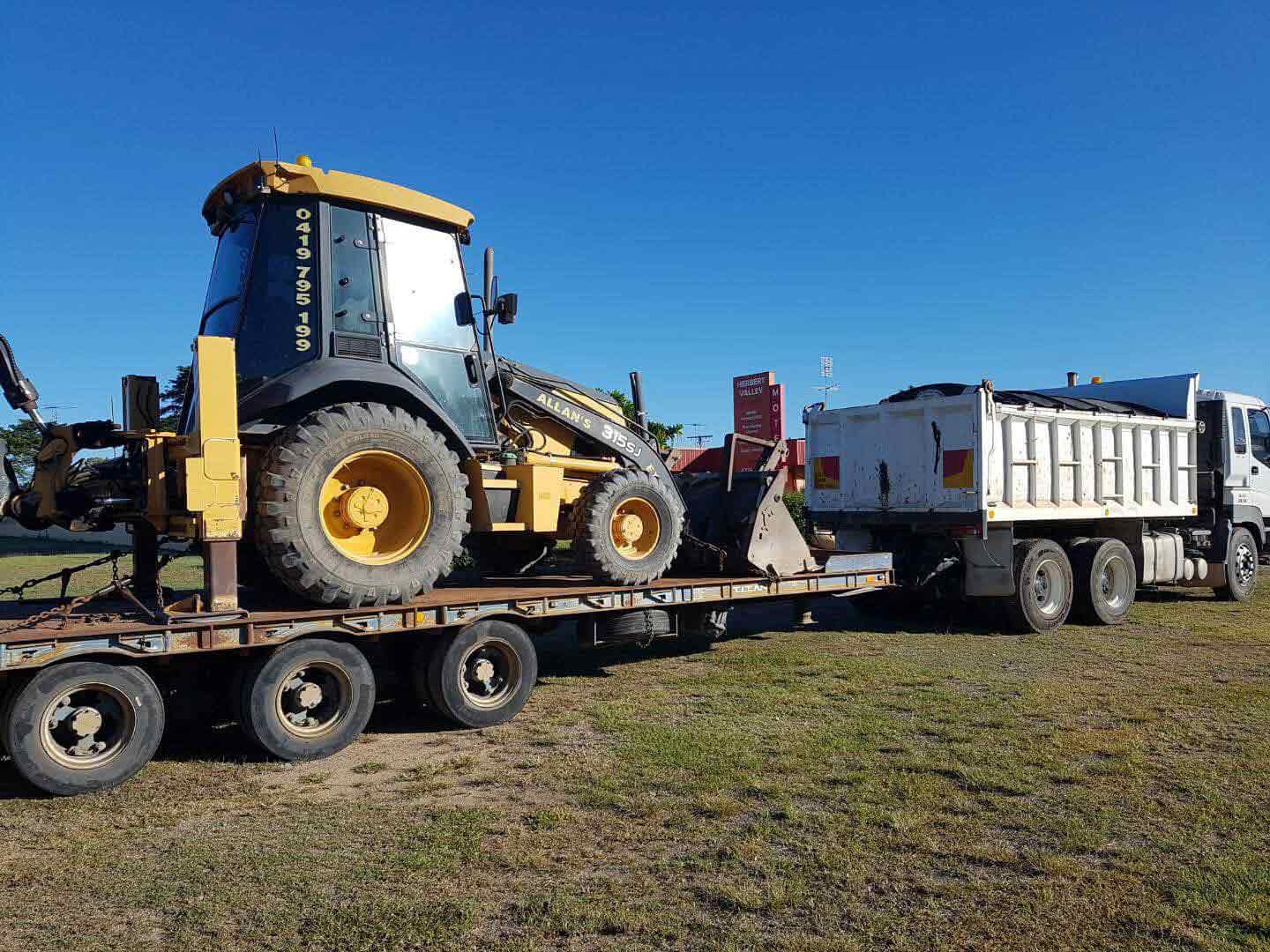 Transporting Mini Excavator — Earthmoving in Townsville QLD