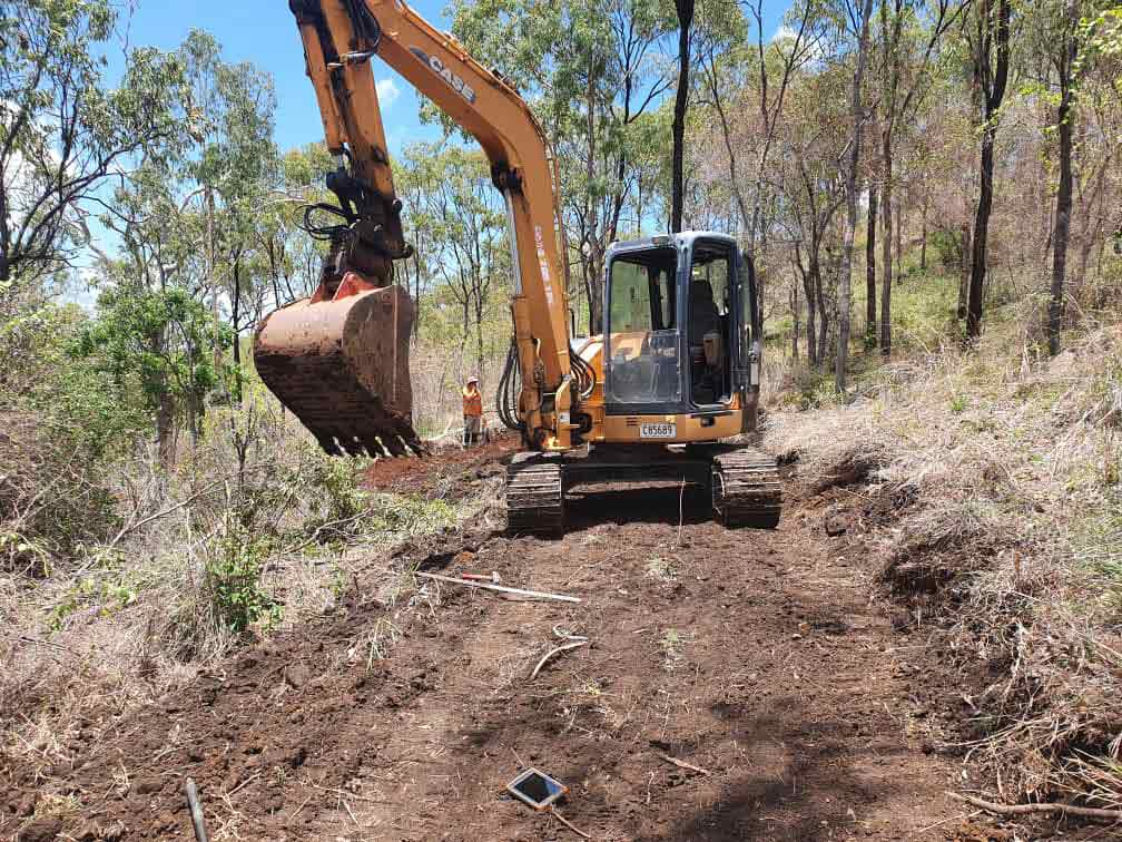 Excavator Clearing Land — Earthmoving in Townsville QLD