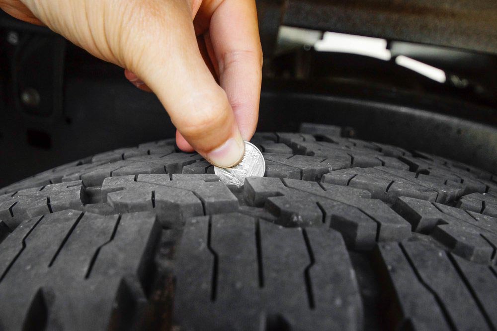 Checking Tyre Tread Using A Coin