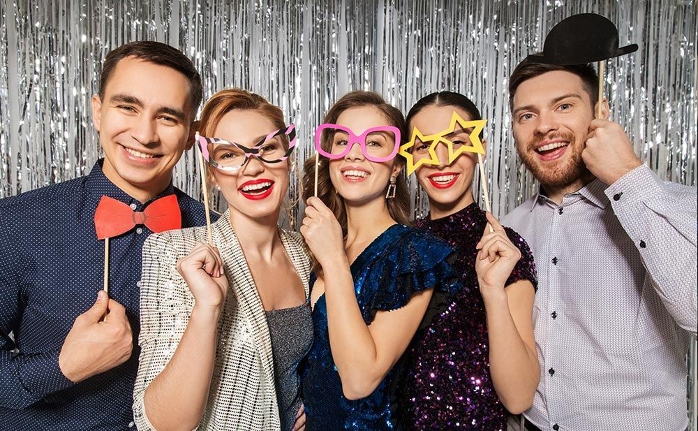 friends posing at a 360 Photo Booth rental in Dallas 