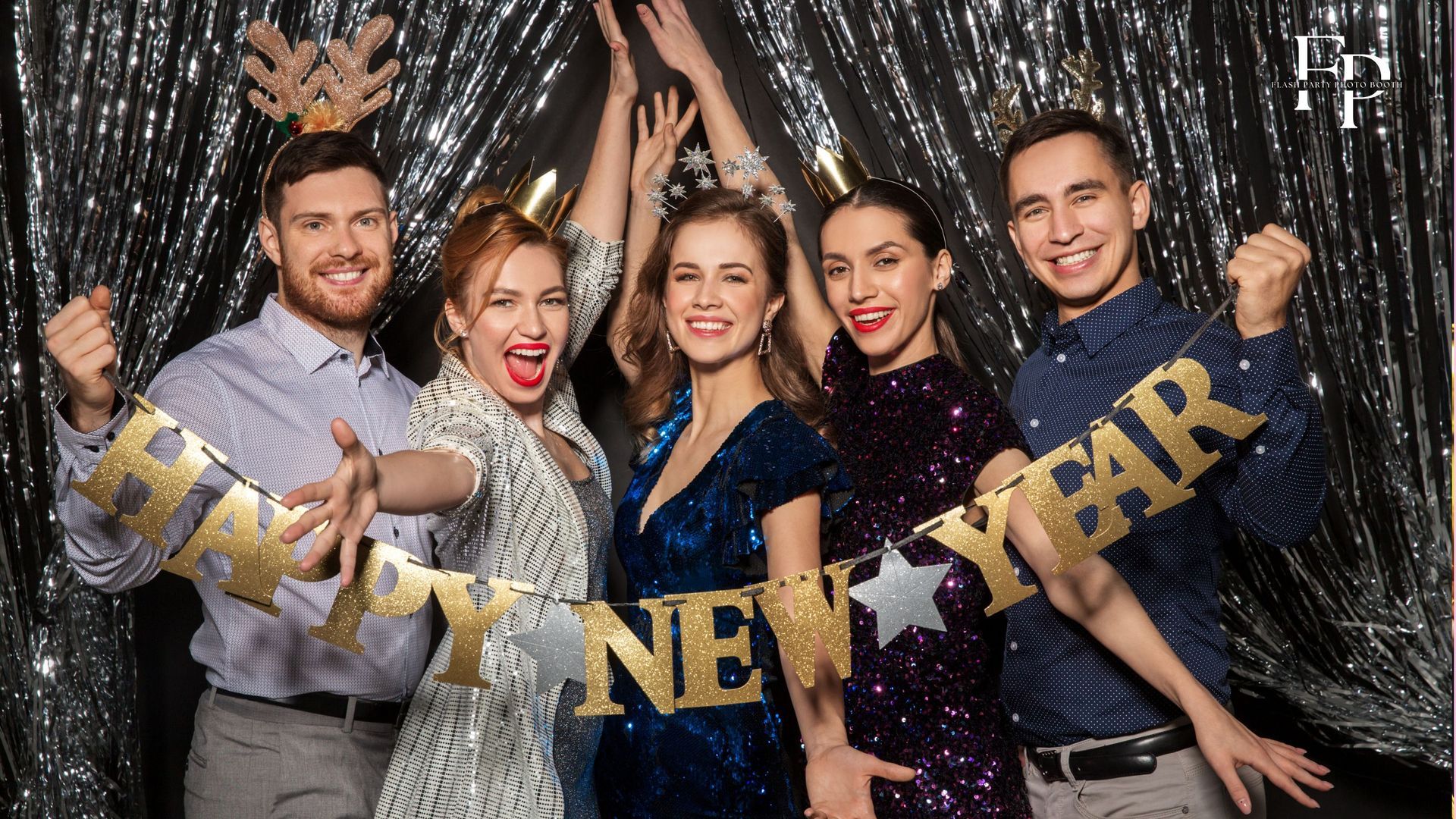 Friends Sharing laughter and joy at a new year's celebration with a flash party photo booth in Sugar Land.