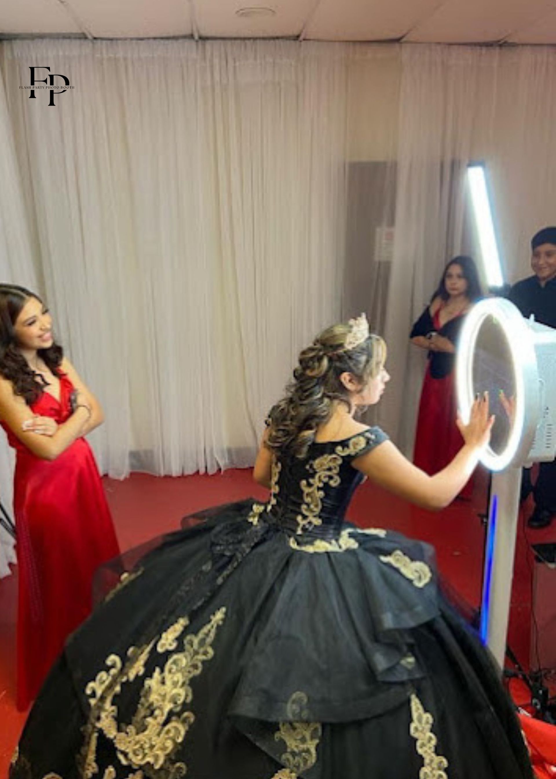 Prom attendees strike a pose together at a Cloee Photo Booth.