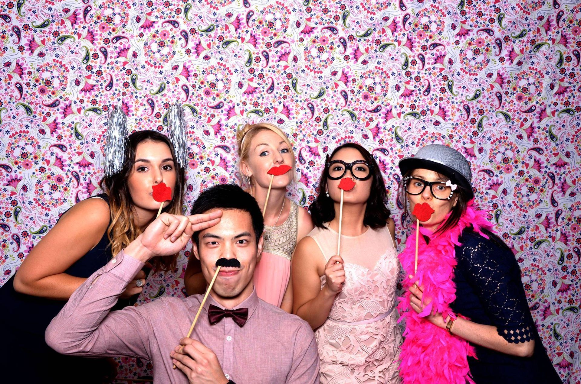Friends creating picture-perfect memories at a lively DMV bachelorette party with Flash Party Photo Booth!