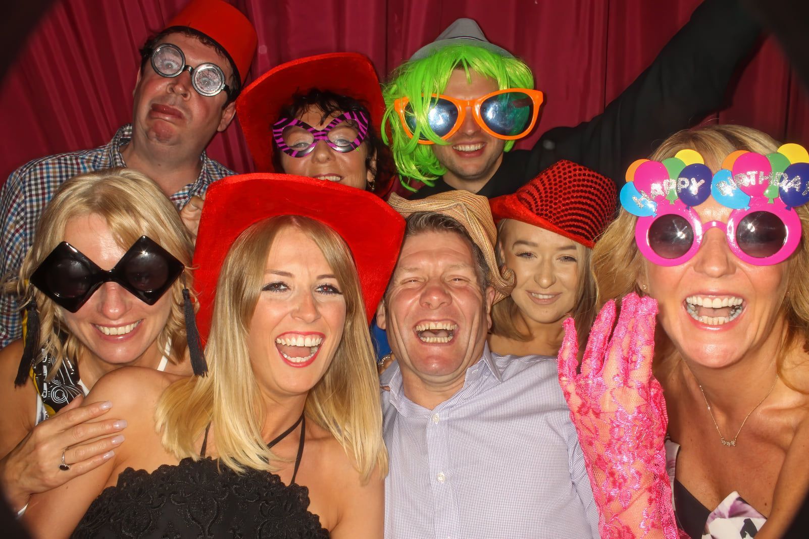 A lively company event in Houston with Flash Party Photo Booth. Our vibrant array of props adds an extra layer of fun, creating cherished memories with every playful pose.