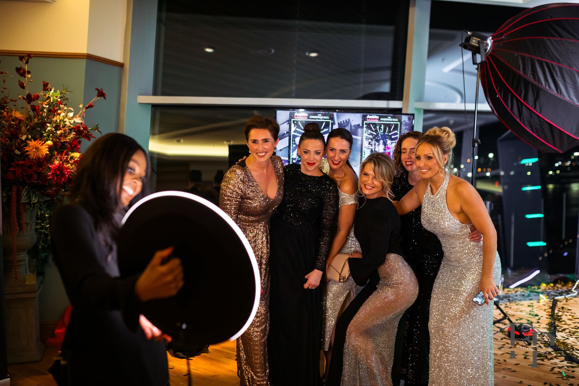 Group of women taking a photo from  Flash party roamer photo booth in a San Antonio event.