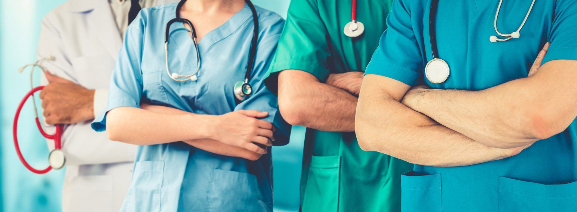 Medical team stacking hands — Tamarac, FL — Metro Health Staffing LLC