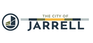 A logo for the city of jarrell with a sailboat in a circle