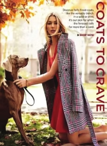 Woman in plaid coat, holding dog leash, kneeling on grass. Autumn leaves, text: 