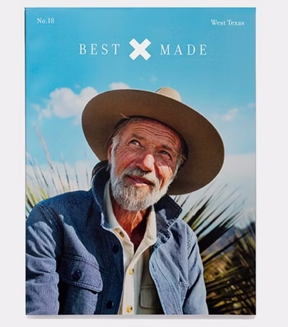 Man in a cowboy hat smiles, looking upward, against a blue sky, Best Made magazine cover, West Texas.