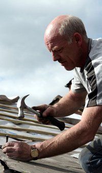 Residential roofing - Ayrshire - S and S Roofing - man doing the roof repair