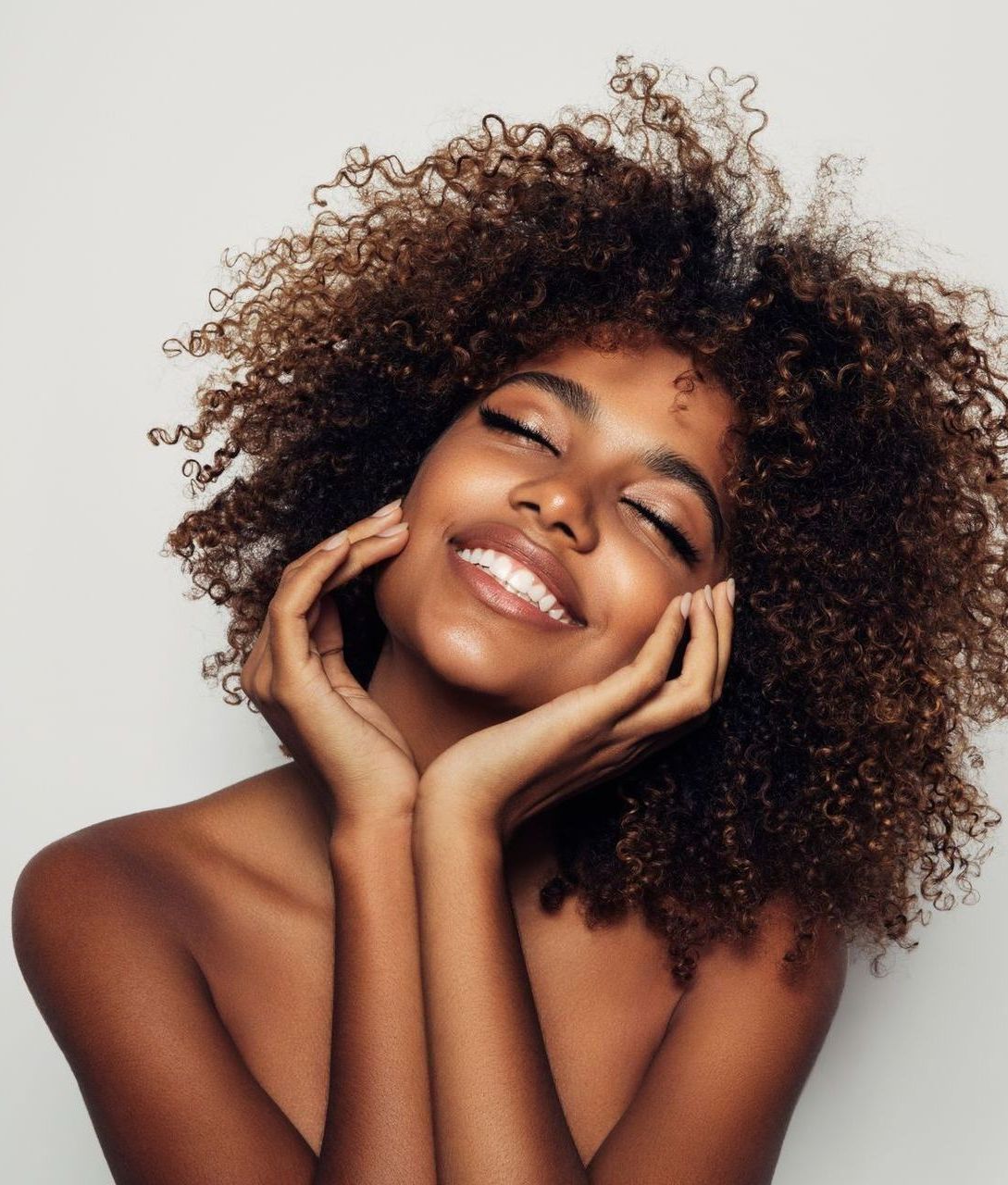 Happy Woman with Curly Hair-Savannah, GA-The Smile and Face Company