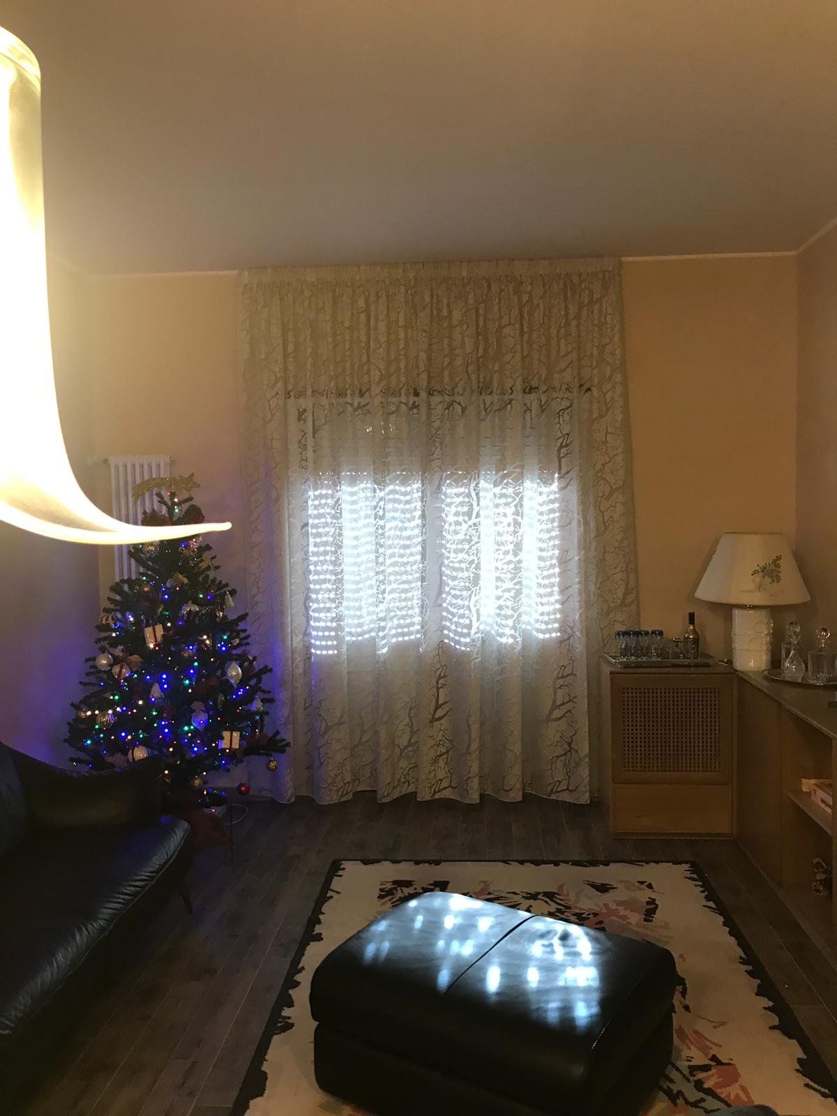 Tenda semitrasparente