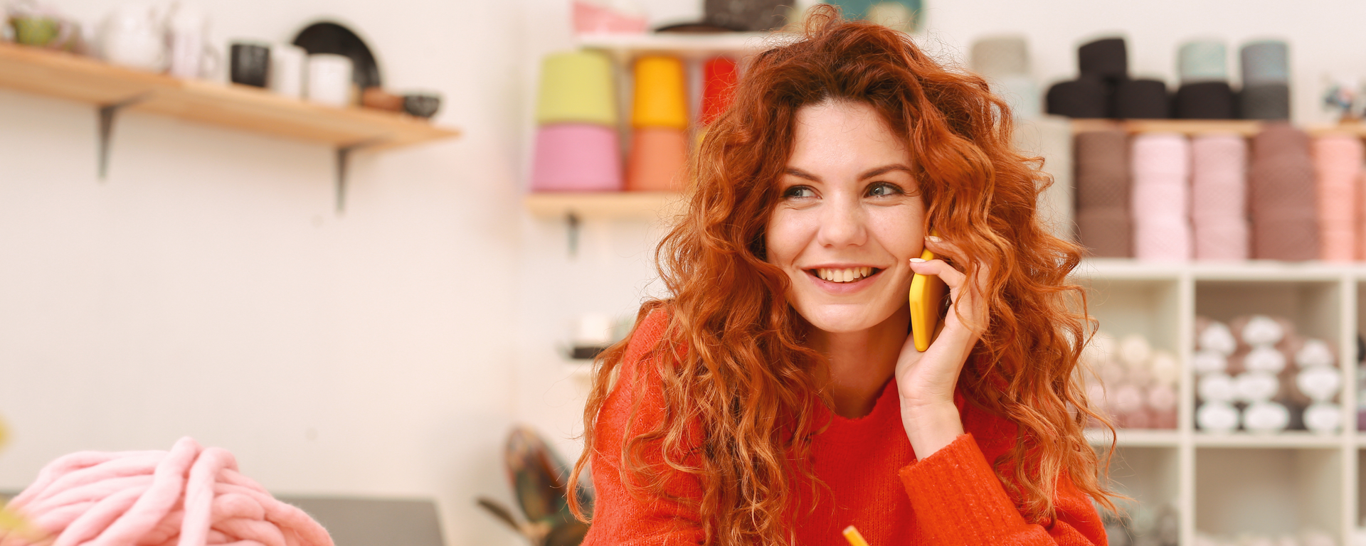 lovely red haired lady talking on the phone