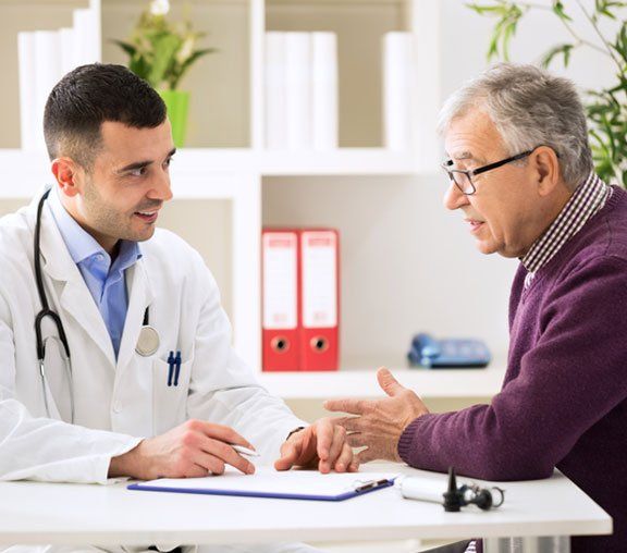 Patient discussing with a doctor - Absence from Work Certificates in Camden North Haven, NSW