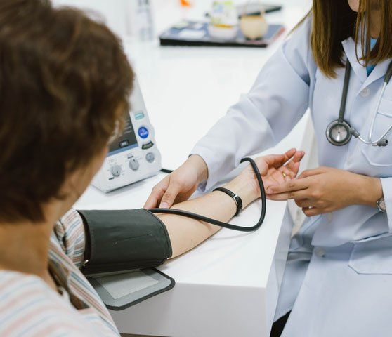 Patient undergoing blood pressure test - Blood Pressure Checks in Camden North Haven, NSW