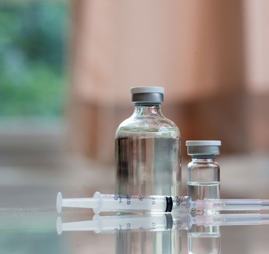 Syringe and bottles for vaccination -  Vaccination in Camden North Haven, NSW