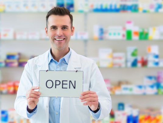 Doctor holding open sign - Free Home Delivery in Camden North Haven, NSW
