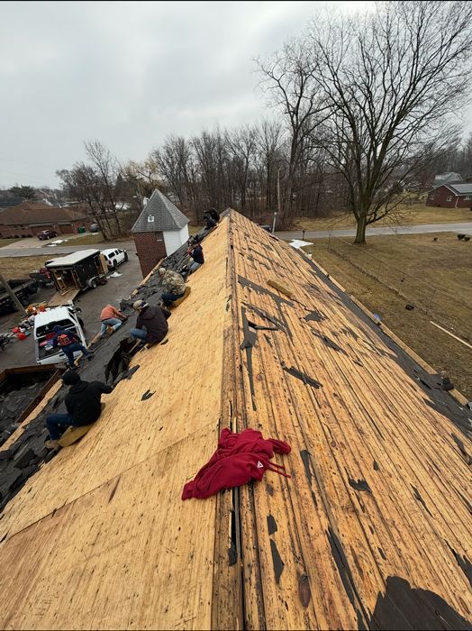 A wooden roof with a red shirt on it