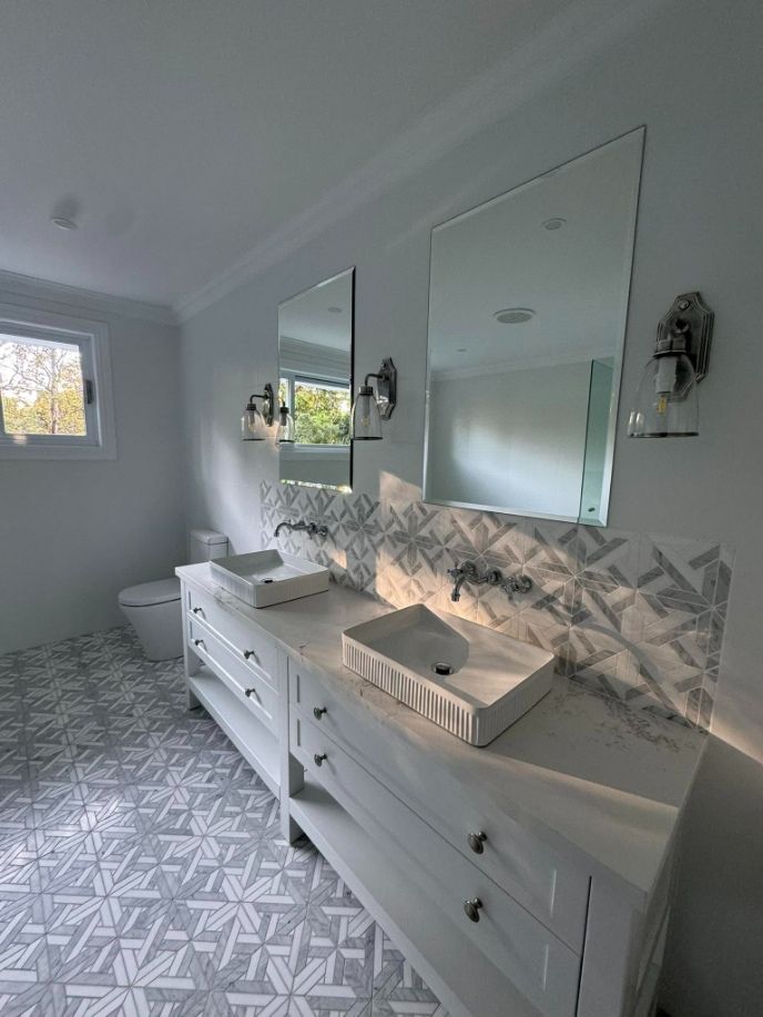 A Bathroom With Two Sinks , Two Mirrors and a Toilet — Fast Glass & Glazing In Barraba, NSW