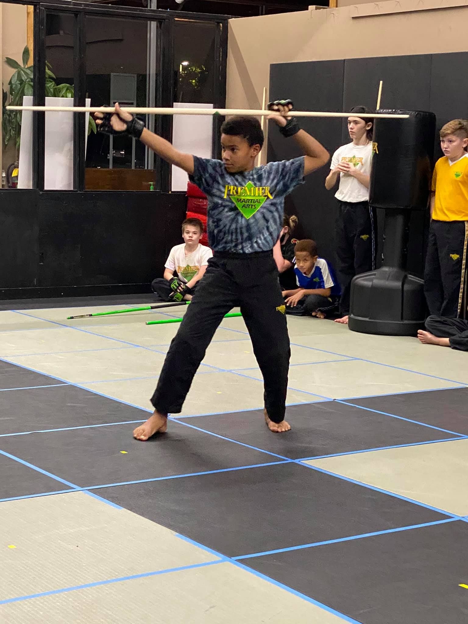 An aerial view of a city skyline at sunset.