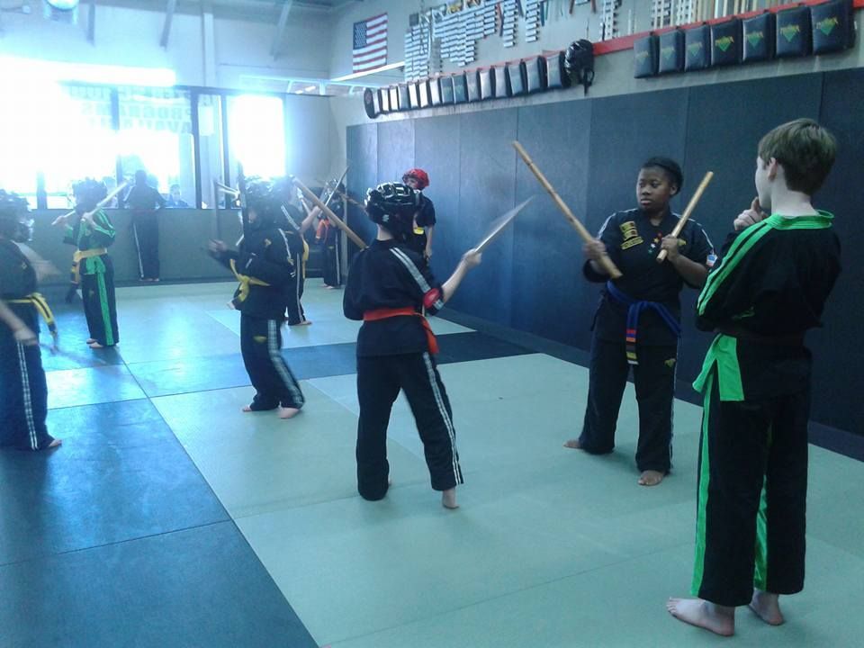 A blurry picture of a bunch of colorful lights on a dark background.