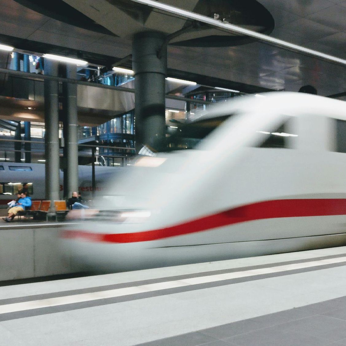 A blurred image of a train going down the tracks