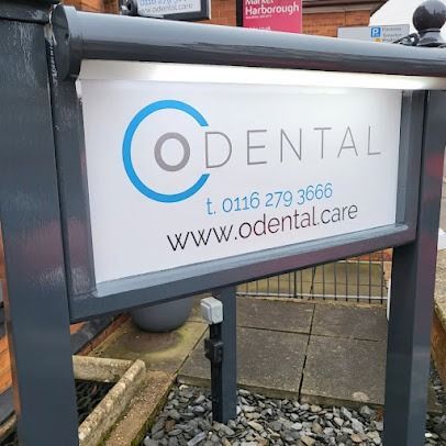 A Sign For Dental Care Is Sitting On A Sidewalk Next To A Fence — JW Signs and Designs In Mount Isa, QLD